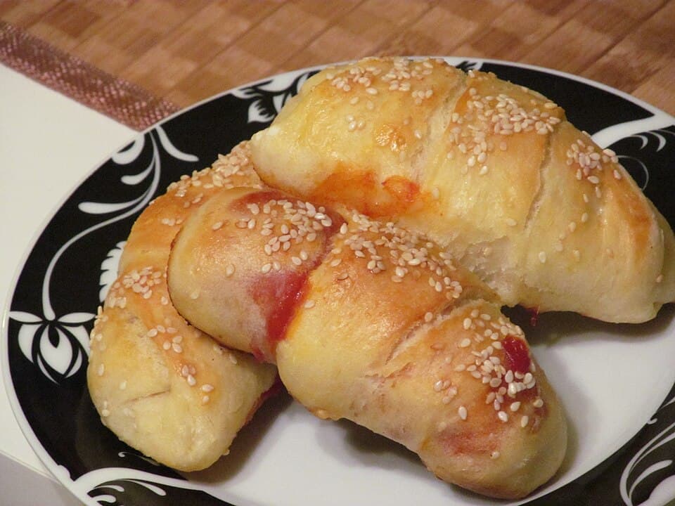 Tray of golden kiflice crescent rolls