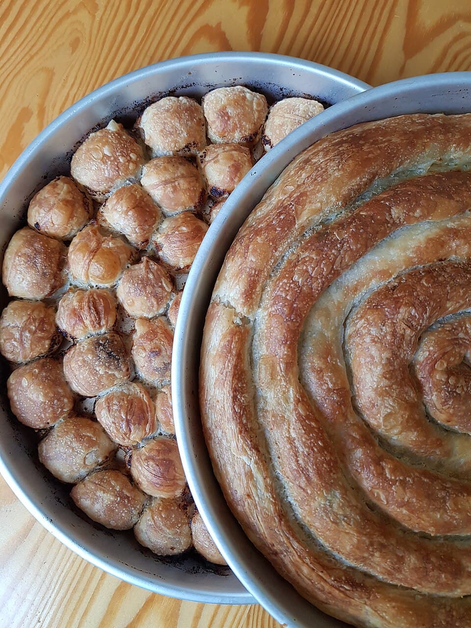 Golden layered Balkan pastries on a tray